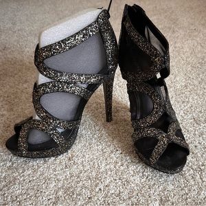Express women’s silver and black glitter heels